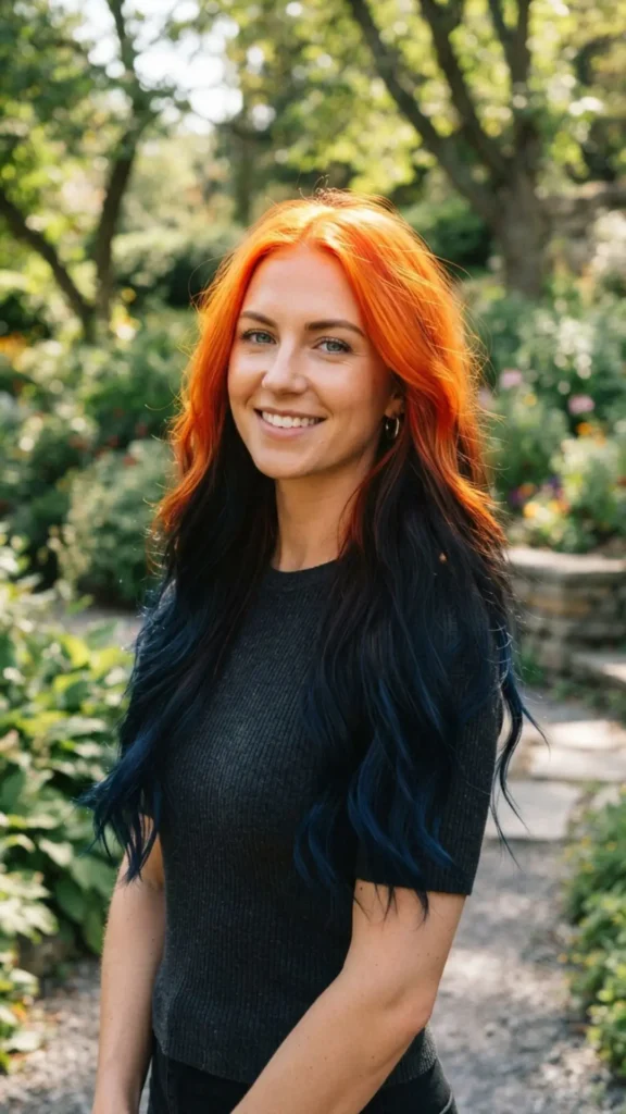 Reverse ombre hair color with a fiery orange crown and darker ends.